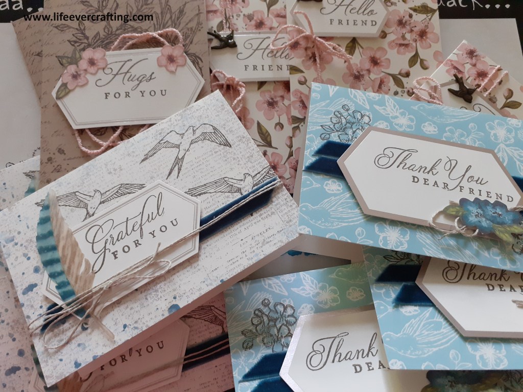 Image shows a pile of cards with different flower and bird designs.